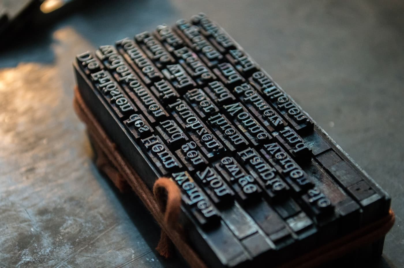 A compositor's type case, its compartments holding sorted pieces of metal letterpress type.